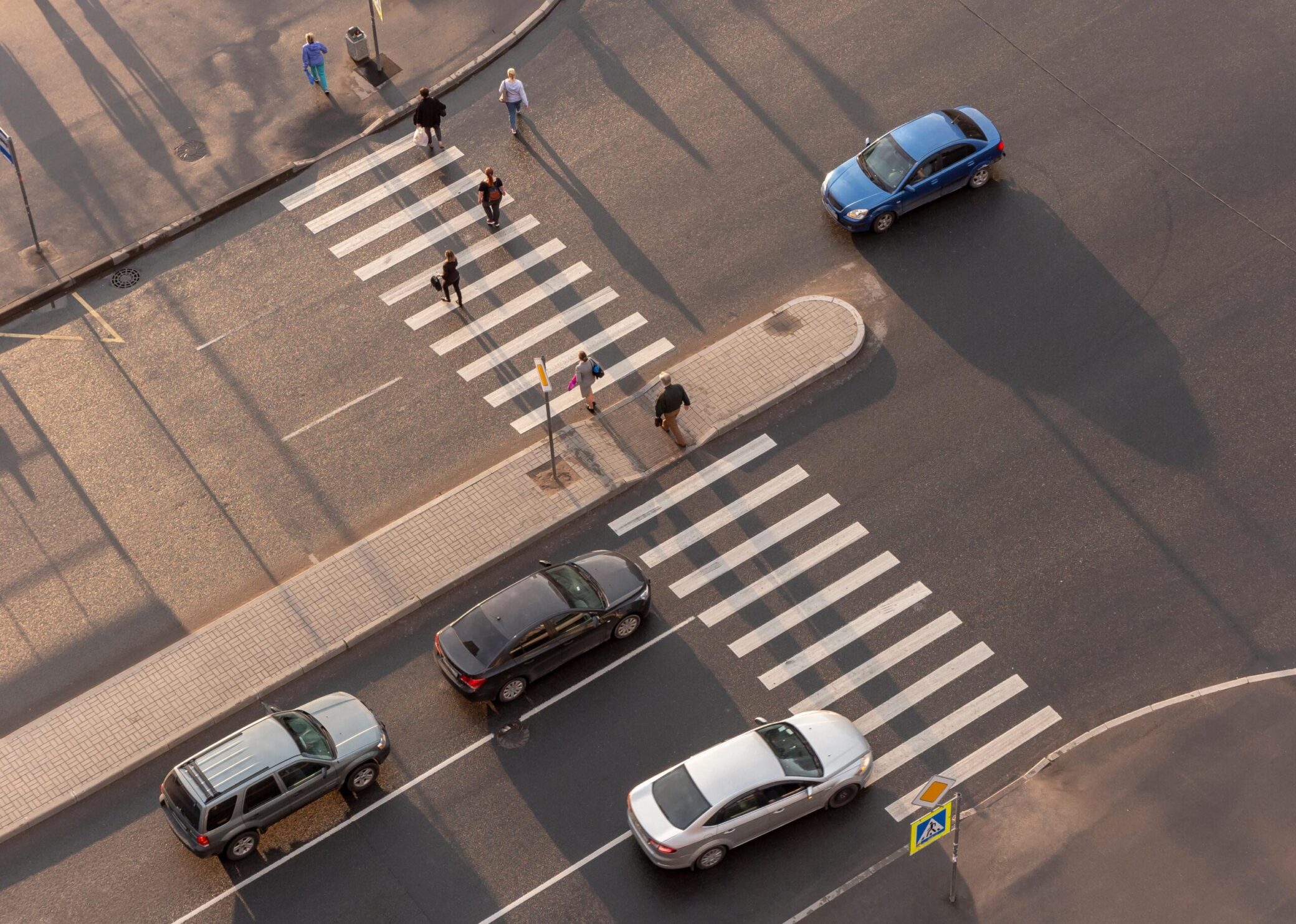 pedestrian crossing the street